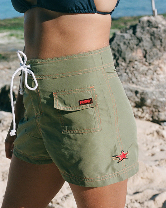 Model wears Friday Classic Boardshorts in Khaki